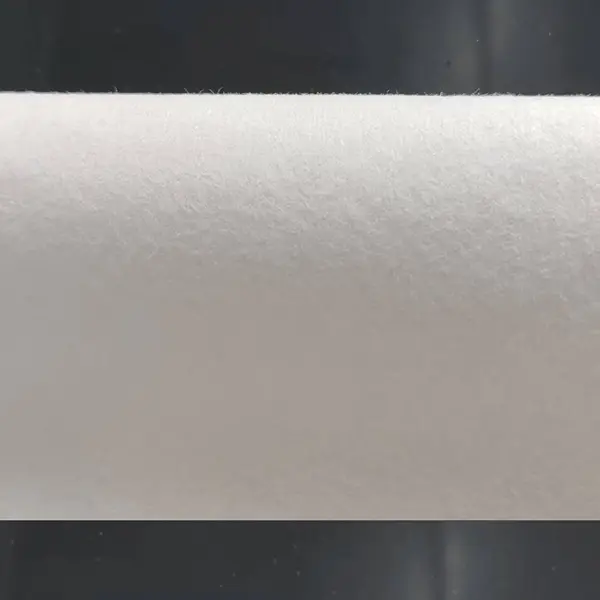 Smooth skin-facing layer of the absorbent core for enhanced softness